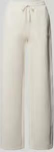 GUESS Activewear Wide fit sweatpants met all-over logoprint model 'Calista'
