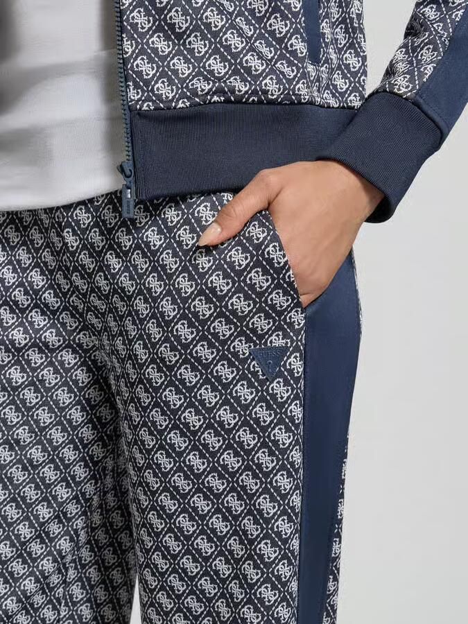 GUESS Activewear Wide leg sweatpants in all-over look model 'MAYA'