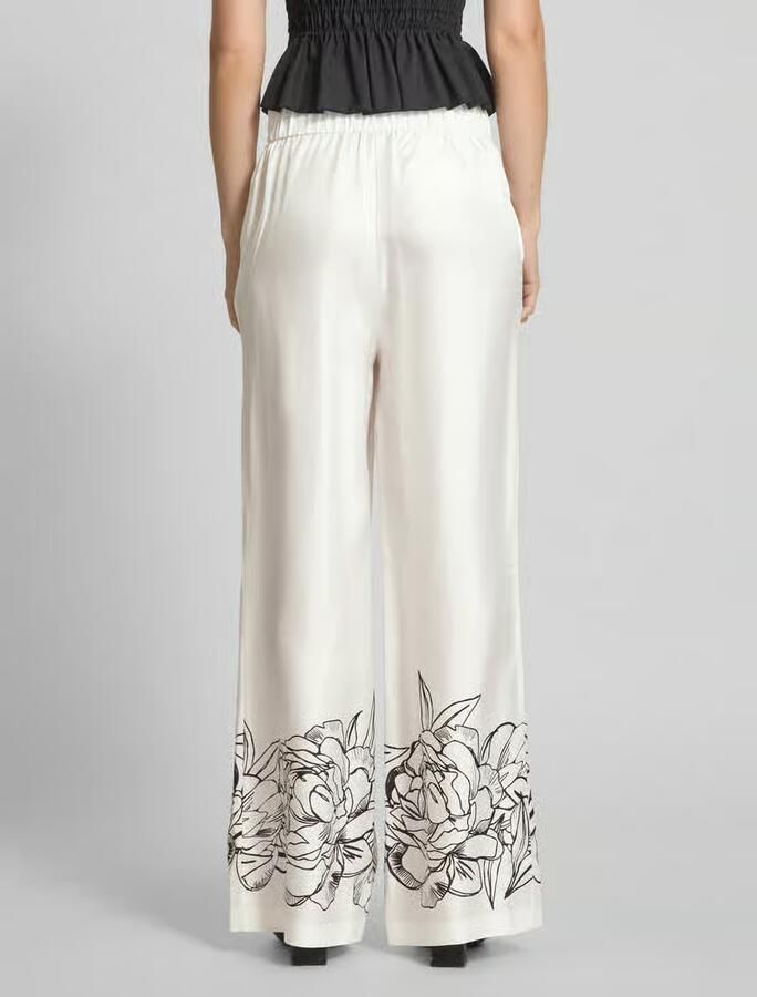 Herzensangelegenheit Flared cut broek van zijde met elastische band