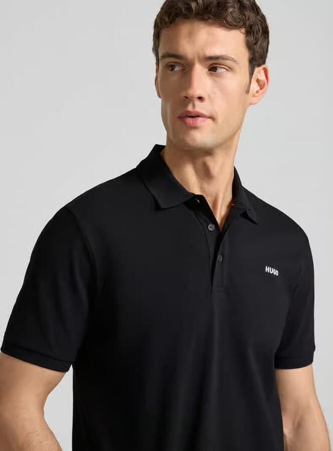 HUGO Regular fit poloshirt van puur katoen model 'DONOS222' - Foto 3