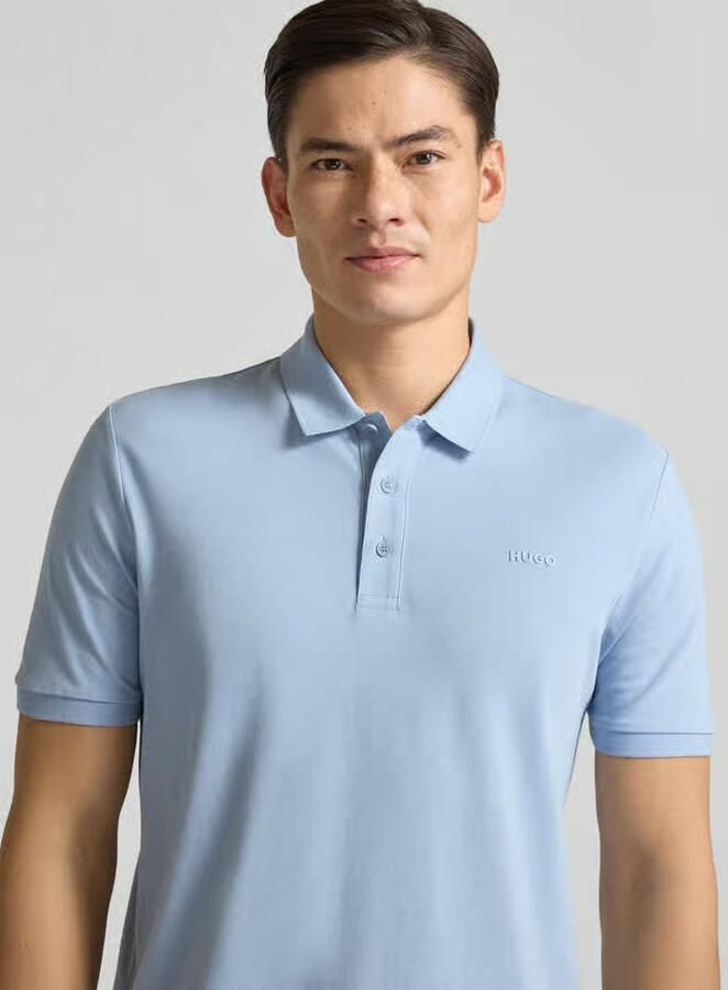 HUGO Regular fit poloshirt van puur katoen model 'DONOS222' - Foto 2