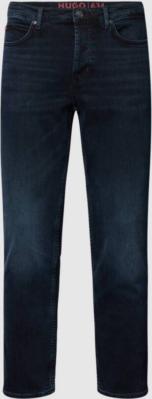 HUGO Slim fit jeans met labeldetails model '