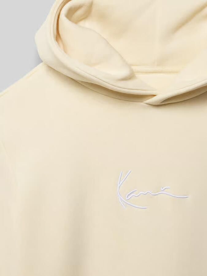 Karl Kani Regular fit hoodie van katoenmix met kangaroezak