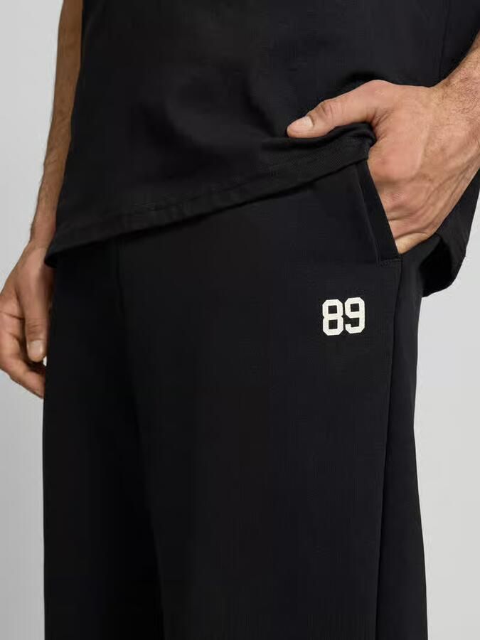 Karl Kani straight fit sweatpants met achterzak