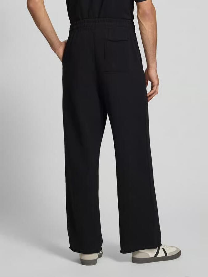Karl Kani straight fit sweatpants met achterzak - Foto 3