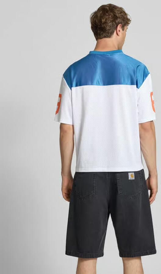 Karl Kani Tricotshirt met logo- en motiefprints model 'OG Sport College'