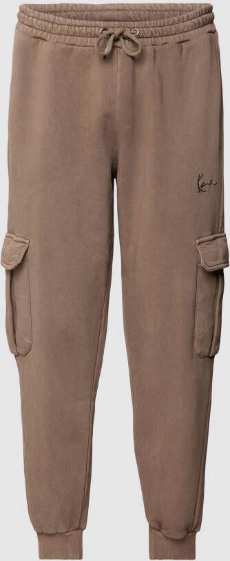 Karl Kani Sweatpants met cargozakken model 'Small Signature Washed Cargo'