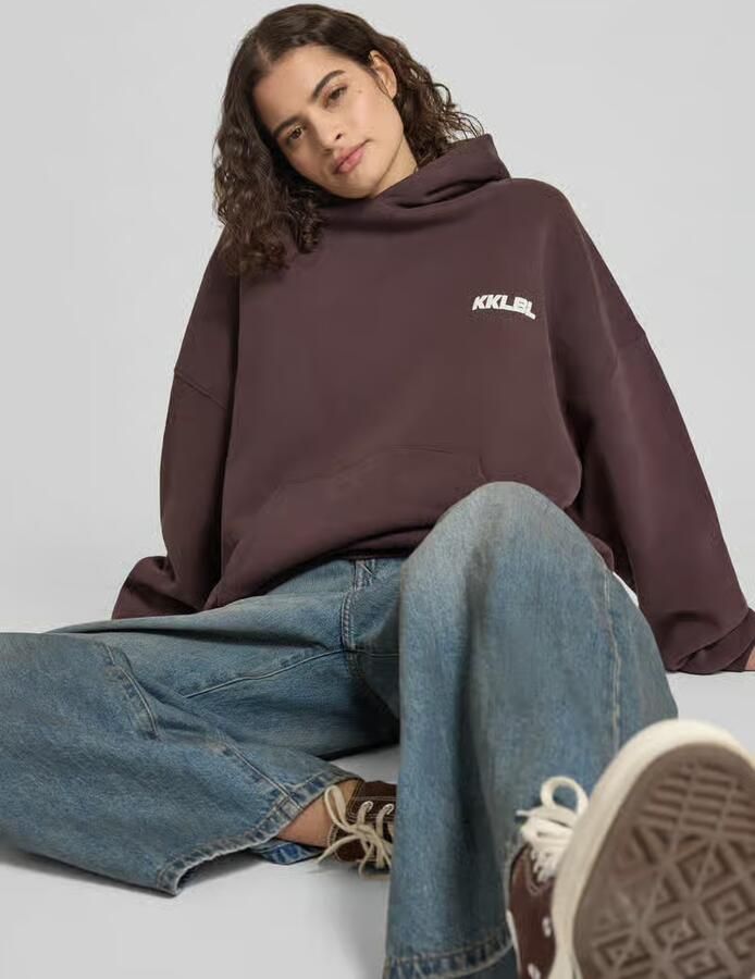 Karo Kauer oversized hoodie met labelprints en kangoeroezak
