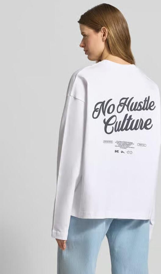 Karo Kauer Oversized shirt met lange mouwen met statementprint op de achterkant