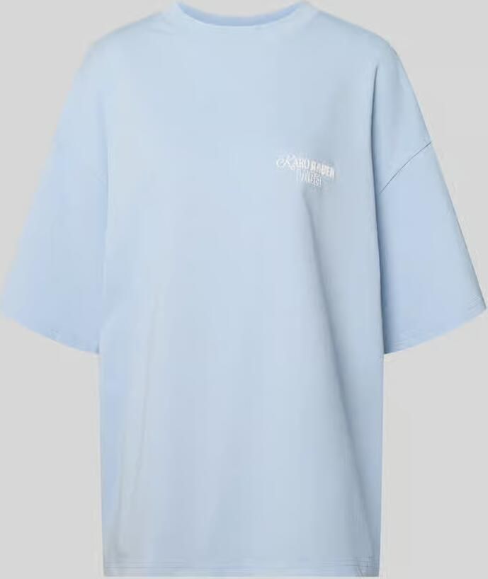 Karo Kauer Oversized T-shirt met statementprint aan de achterkant