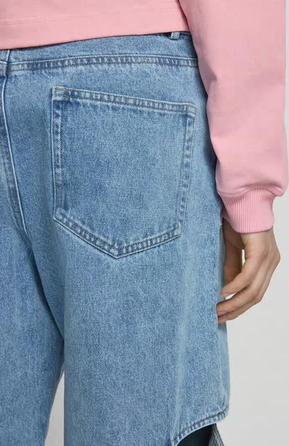 Karo Kauer Wide leg jeans met cut out