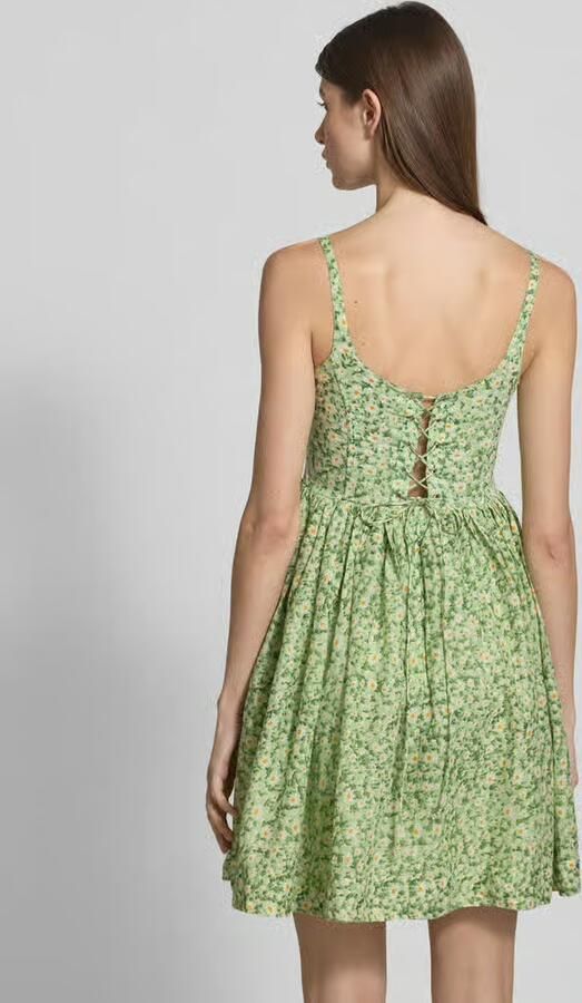 Lace & Beads Cocktailjurk met veters aan de achterkant