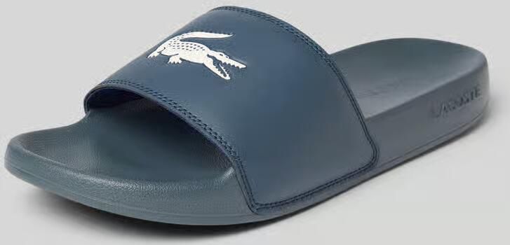 Lacoste Badslippers met logo print model 'SERVE SLIDE'