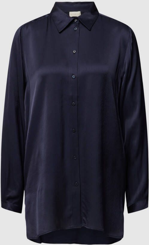 Milano italy Overhemdblouse met verlengd rugpand.