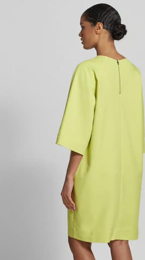 More Knielange jurk met V-hals