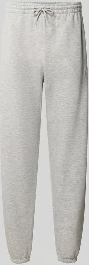 New Balance Regular fit sweatpants van katoenmix met labelstitching