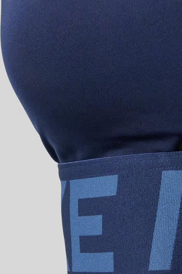 Nike Training Bustier met labeldetails en cut-out