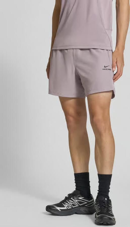 Nike Training Shorts met logo en elastische tailleband - Foto 4