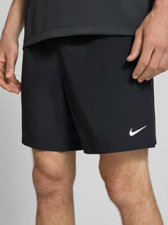 Nike Training Shorts met logoprint en steekzakken