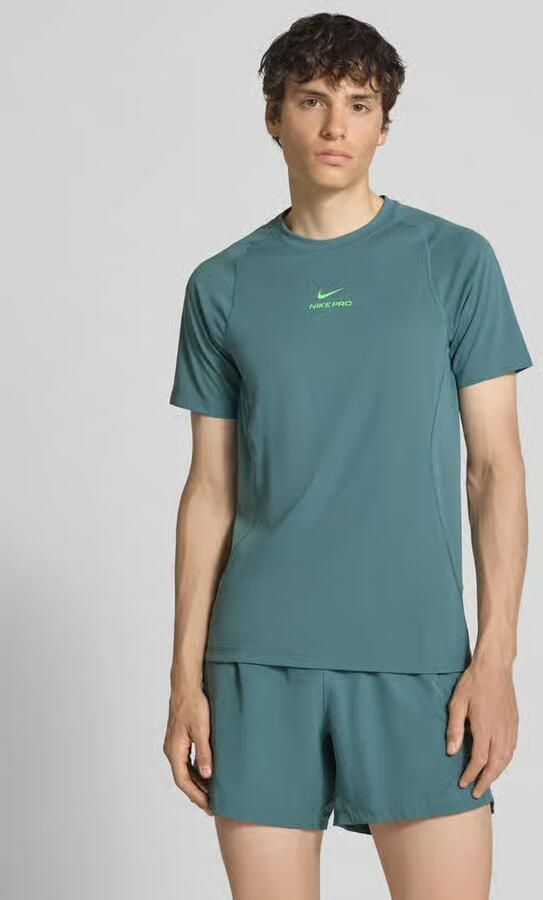 Nike Training T-shirt met logoprint en raglanmouwen - Foto 3
