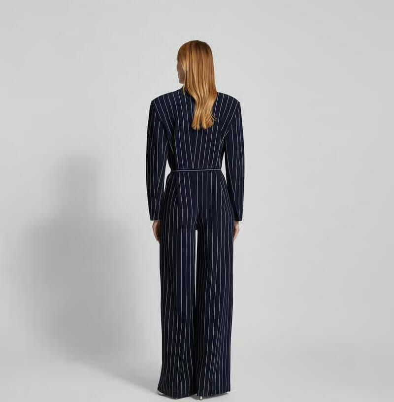 Norma Kamali jumpsuit met reverskraag - Foto 3