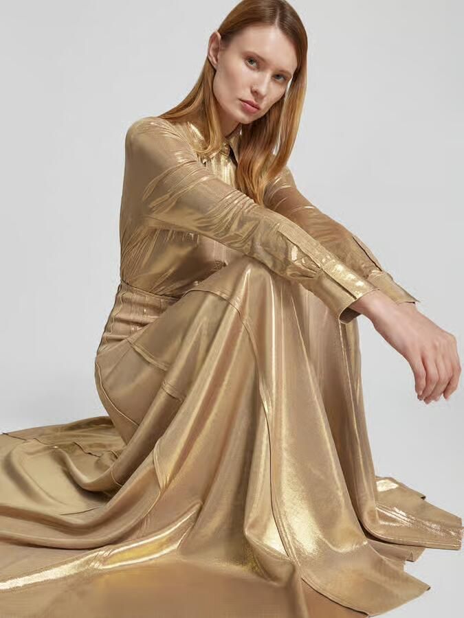 Norma Kamali overhemdblouse met verborgen knoopsluiting