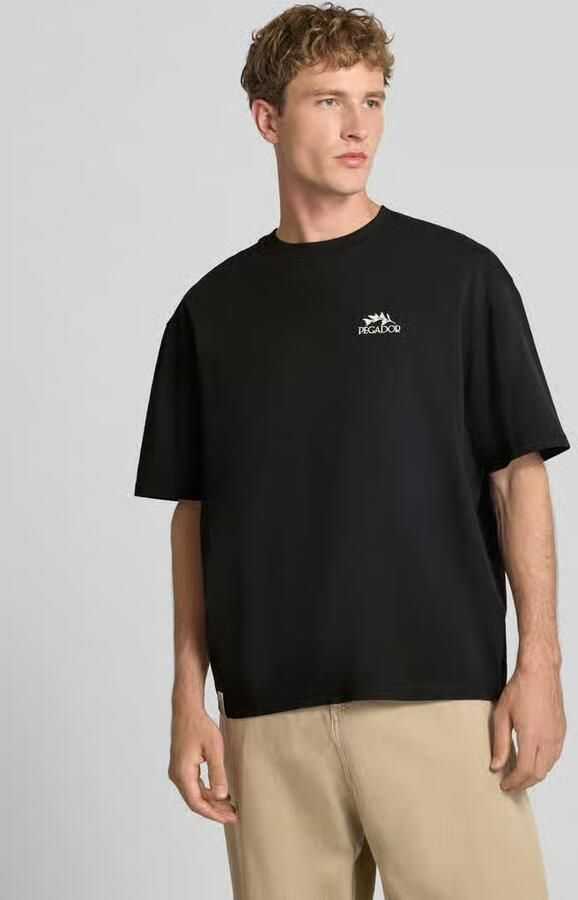 PEGADOR oversized t-shirt met print op de achterkant - Foto 3