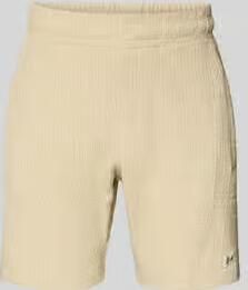 PEGADOR Short met labelpatch model 'LIBCO'