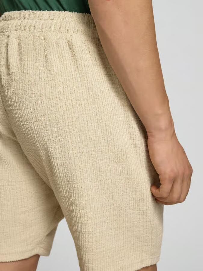 PEGADOR Short met labelpatch model 'LIBCO'