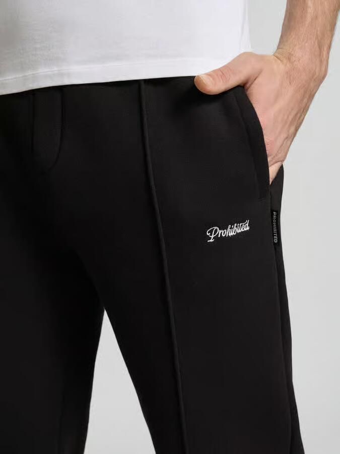 PROHIBITED Loose fit sweatpants met labelstitching en elastische band