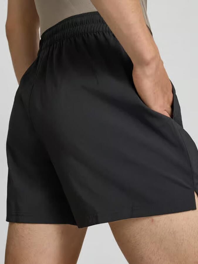 PUMA Trainingsshort M TAD ESSENTIALS 5" WOVEN SHORT Heren basic trainingsshorts zweetafvoerend - Foto 7