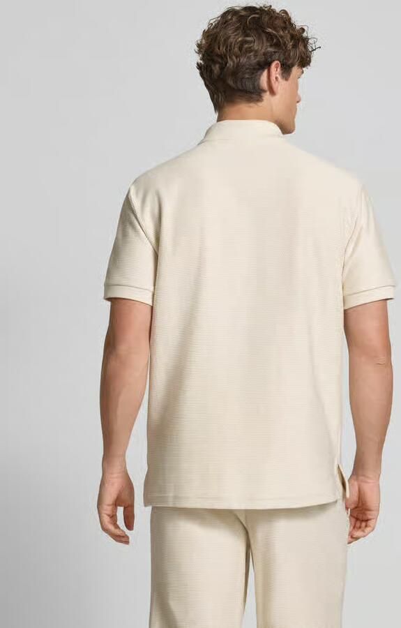PUMA Performance Relaxed fit poloshirt met labelstitching