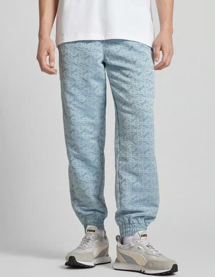 PUMA Performance Sweatpants met all-over motief - Foto 2