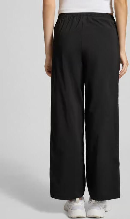 Puma Wide leg sweatpants met logodetail