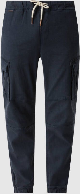 REVIEW Cargobroek met labeldetail