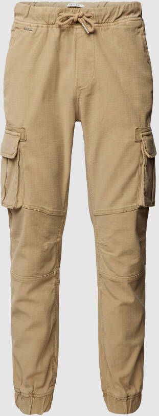 REVIEW Cargobroek met labeldetail