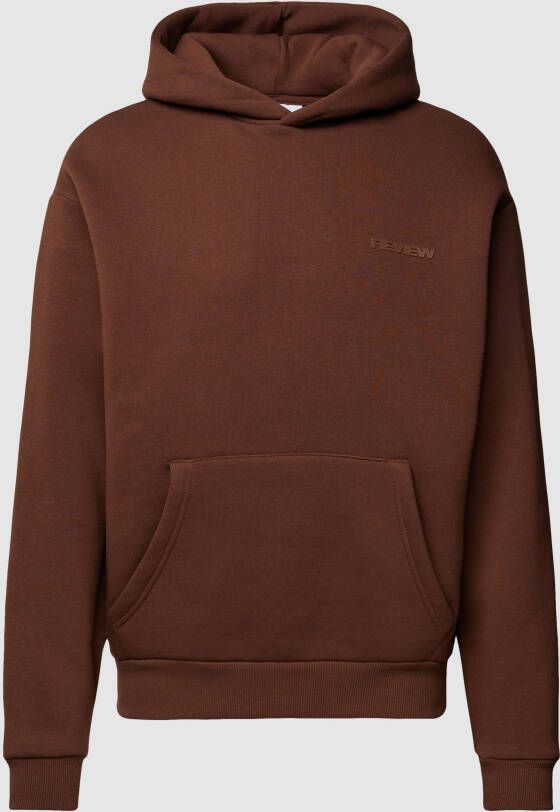 REVIEW Essentials hoodie met logo