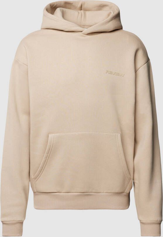 REVIEW Oversized hoodie met labeldetail