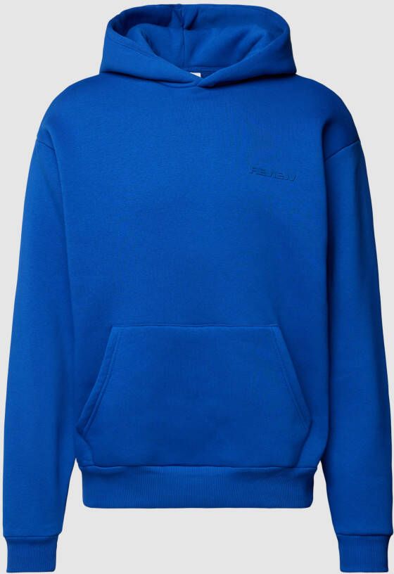 REVIEW Essentials hoodie met logo