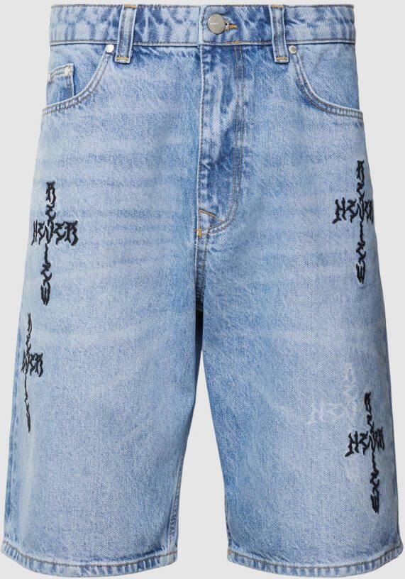 REVIEW Korte jeans met motiefstitching