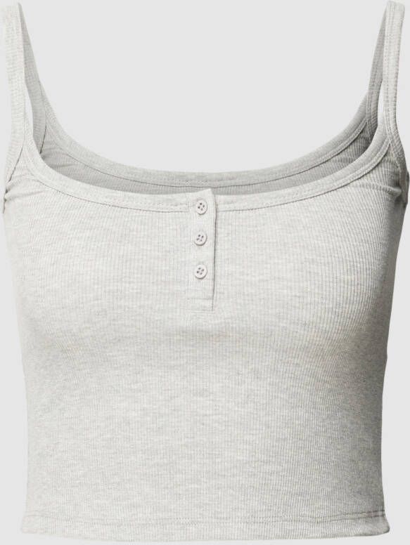 REVIEW Korte top met korte knoopsluiting