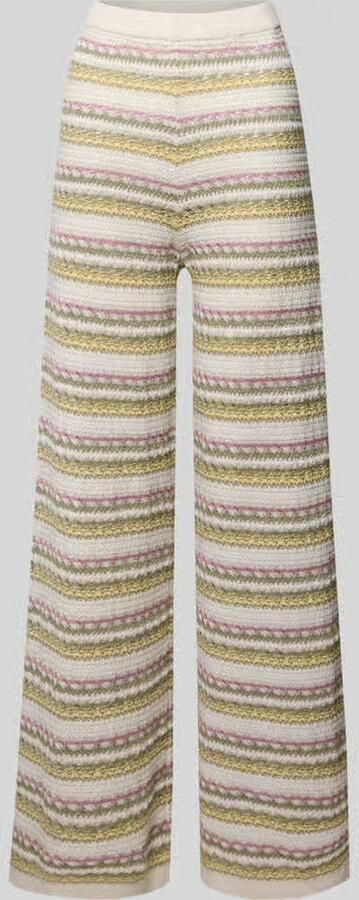 REVIEW Bootcut broek in all-over look