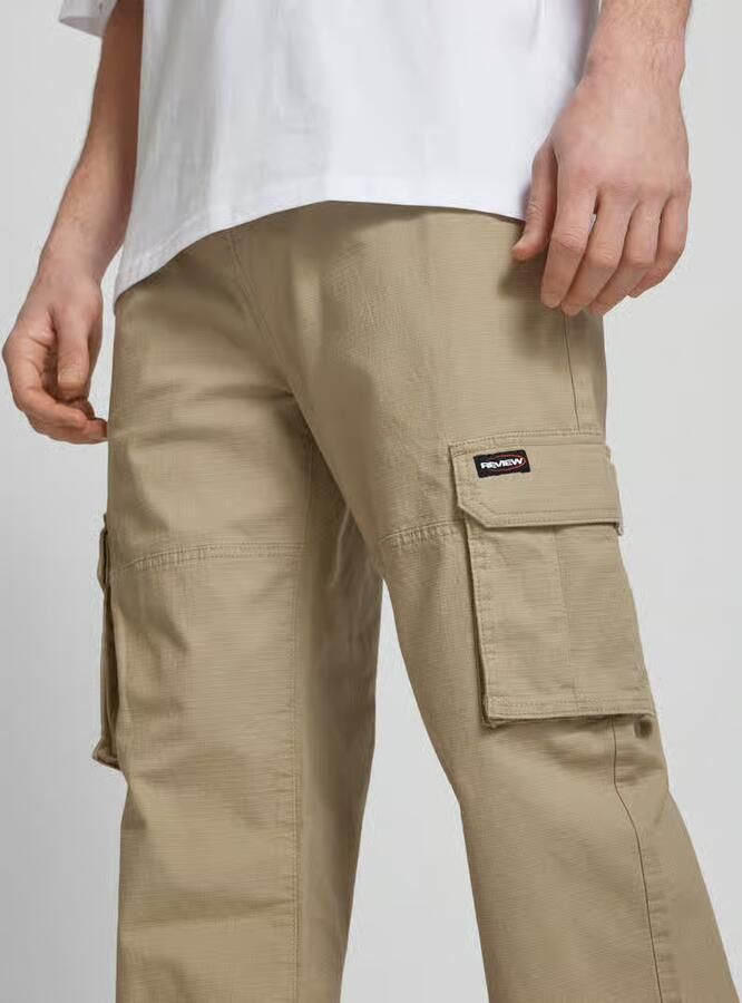 REVIEW Cargobroek met labeldetail - Foto 2
