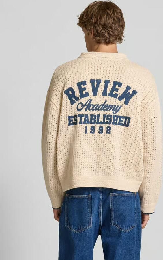 REVIEW Gebreid jack met polokraag en knoopsluiting