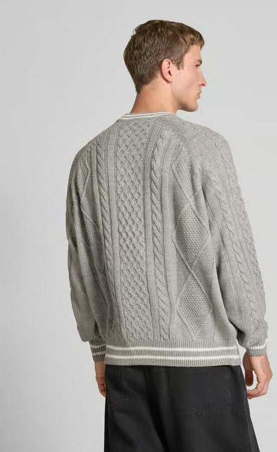 REVIEW Gebreide pullover met labelstitching