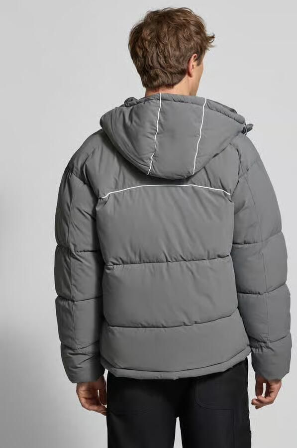 REVIEW Jack met ritszakken en labeldetail