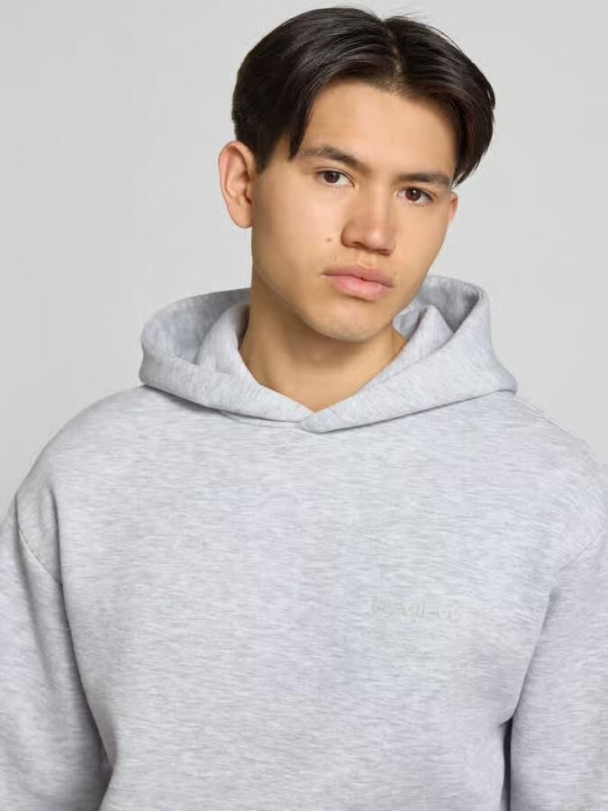 REVIEW Essentials hoodie met logo