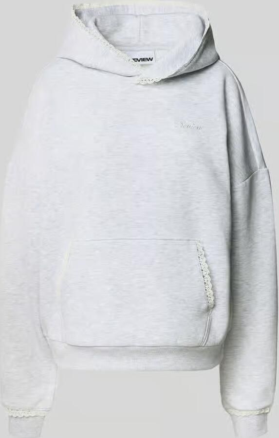 REVIEW Hoodie met kanten randen aan capuchon kangoeroezak en mouwboord - Foto 2