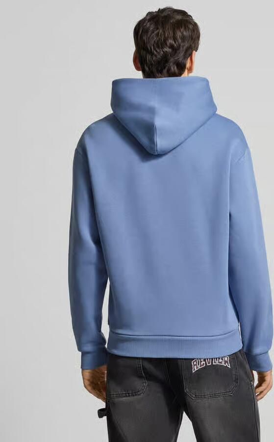 REVIEW Essentials hoodie met logo