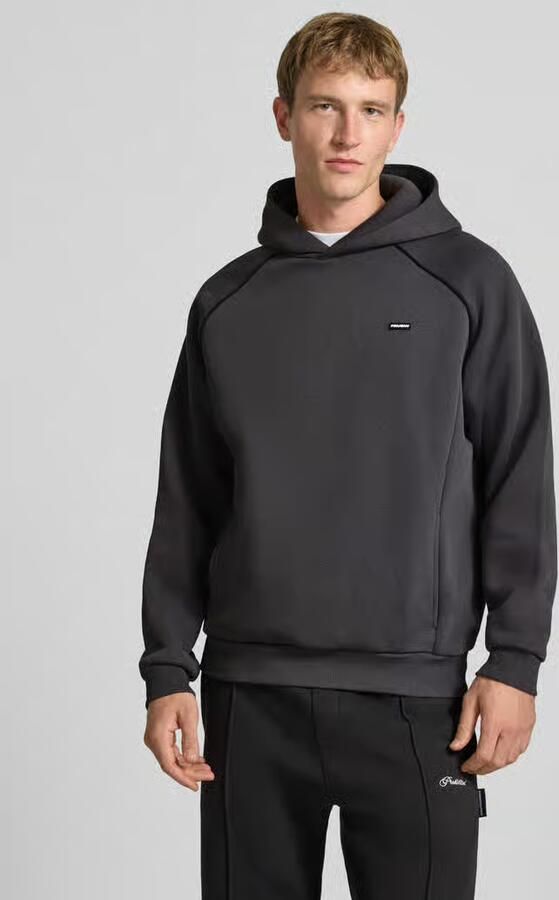 REVIEW Hoodie met logoprint en contrasterende biezen - Foto 3